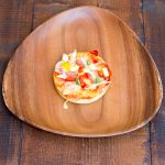ふわふわ生地にピザソース、季節の野菜を載せました！その他明太子ピザなどいろいろあります。